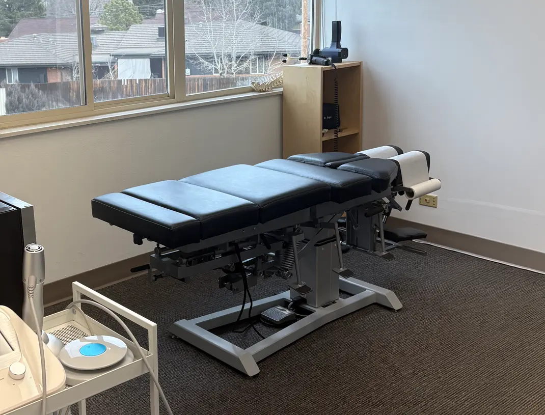 A treatment room with an adjustment table